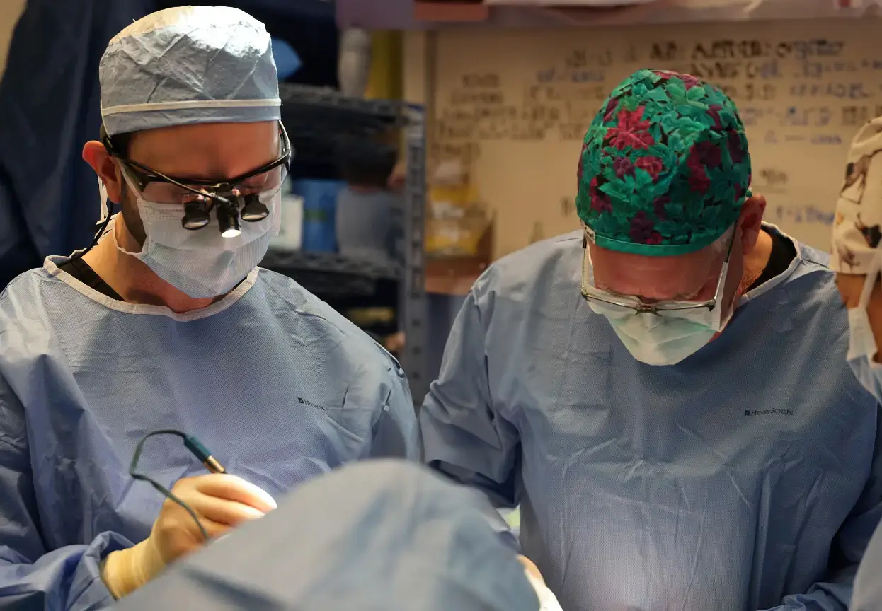 Dr. Smith and Dr. Bovenzi performing surgery at their Denver surgery center